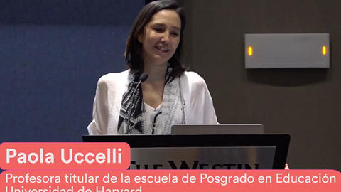 Paola speaking at event at Weston Hotel